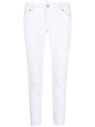 distressed-effect skinny jeans