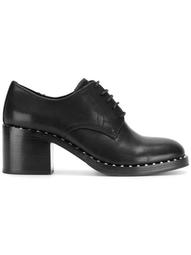 studded and heeled oxford shoes